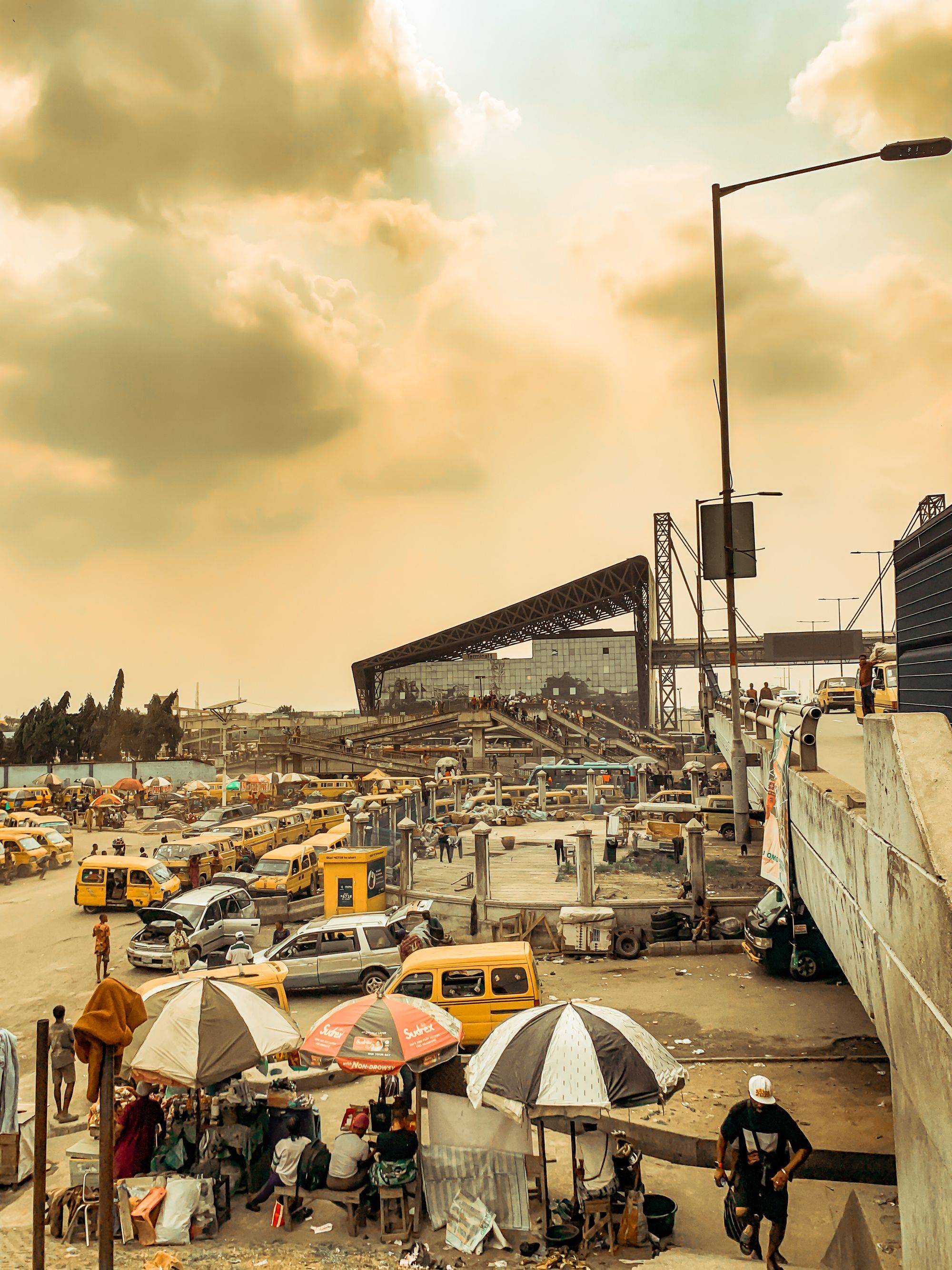 Bustling Lagos street market at sunset
