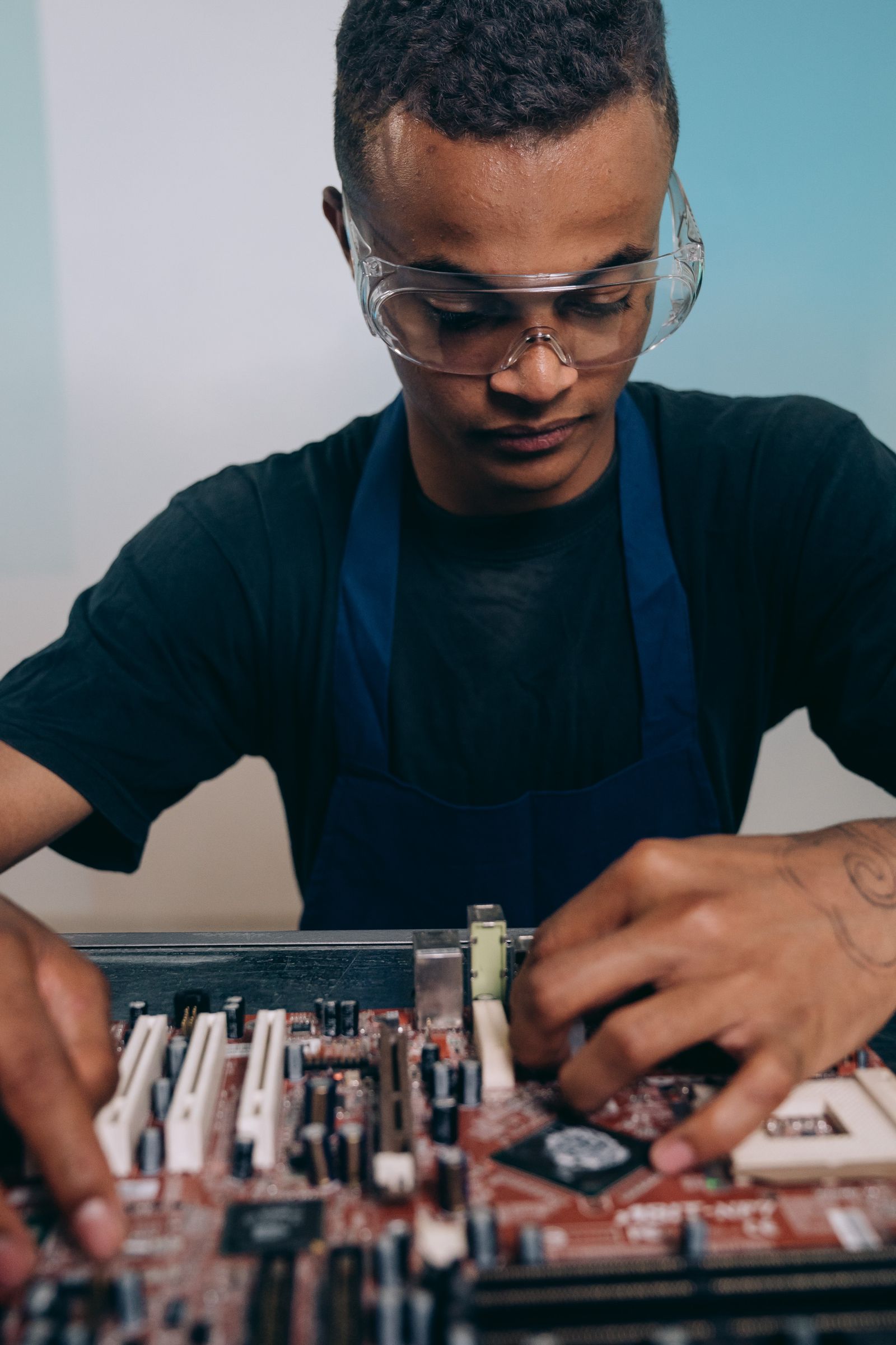 Technician repairing equipment